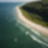 Aerial view of kiteboarders in action on the water