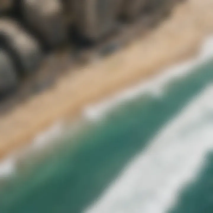 Aerial view of Waikiki Beach with surfers catching waves