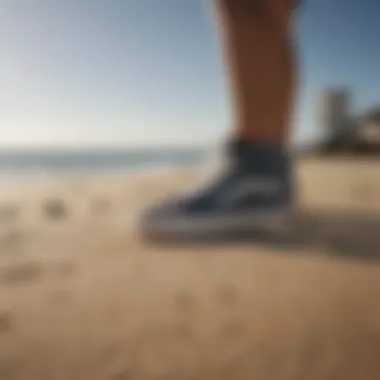 Stylish Vans Surf Siders on a sandy beach.