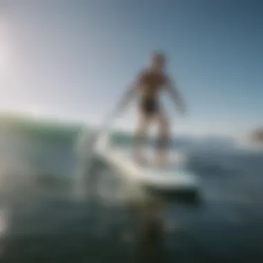 Surfer riding a paddle board with precision