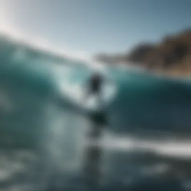 Surfboarder navigating through crystal clear waters