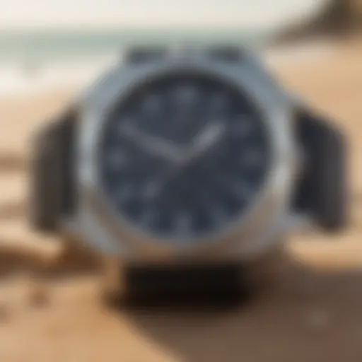 A close-up of a durable beach watch against a sandy backdrop