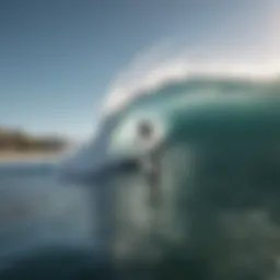 An aerial view of a surfer riding the perfect wave