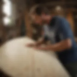 Artisan crafting a surfboard masterpiece