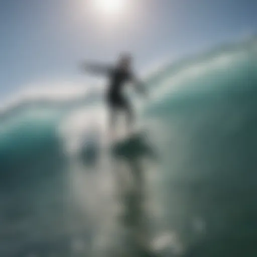 Surfer riding a 6 ft foam surfboard in crystal clear waves