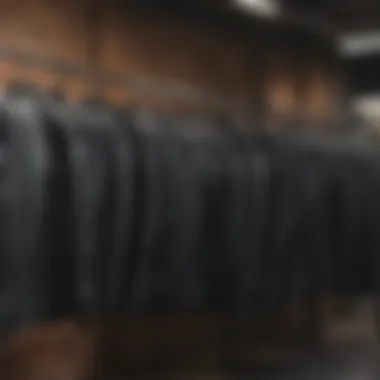 Different types of wetsuit fits displayed on a rack