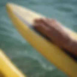 Detailed view of a surfboard with hand blisters treatment kit