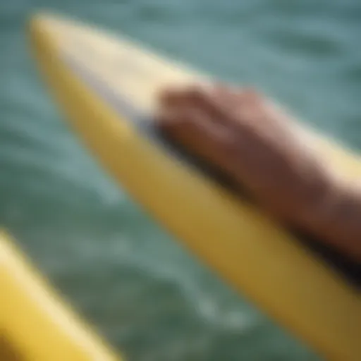 Detailed view of a surfboard with hand blisters treatment kit