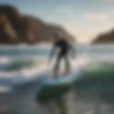 Electric surfboard gliding on crystal-clear waves