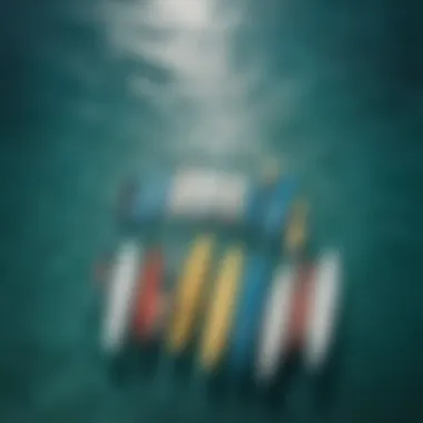 Aerial shot of a group of surfboards lined up on a vibrant blue ocean