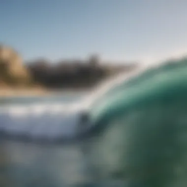 Surfer catching a wave during a Lisbon surf lesson