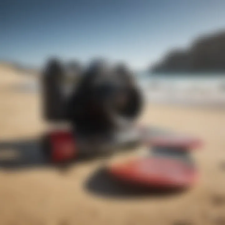 Surfing equipment lined up on a sandy beach in Lisbon