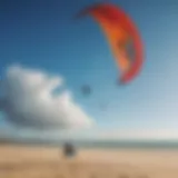 A vibrant kiteboarding scene at a northern Australian beach, showcasing colorful kites against a blue sky.