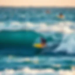 Surfer riding the waves at Padang Padang Beach