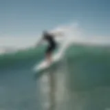 Surfers catching the perfect wave at Ponce Inlet