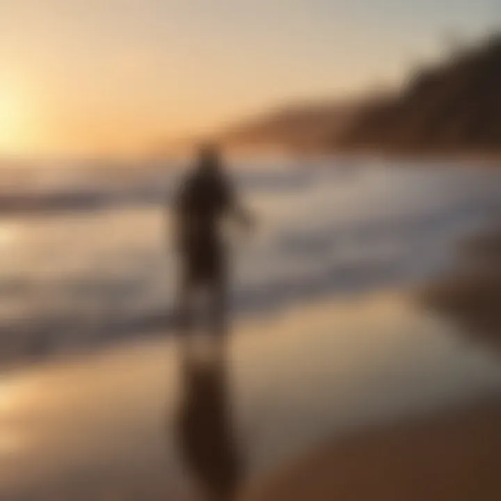 Sunset silhouette of a fisherman on the beach