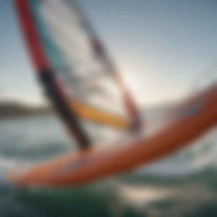 Close-up of windsurfing equipment showcasing the sail and board