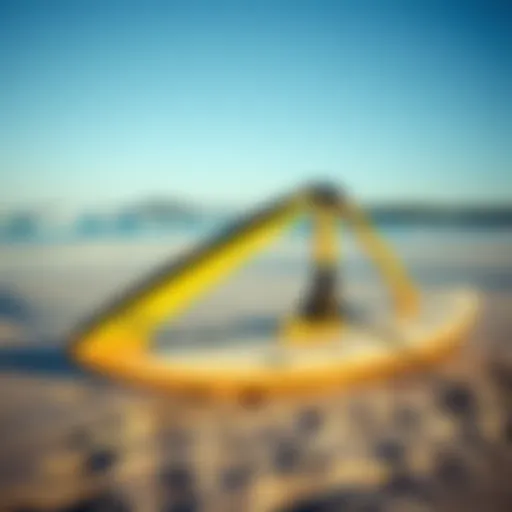 A vintage hydrofoil displayed on a sandy beach, showcasing its unique design.