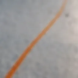 A close-up of the textured surface of a soft top surfboard