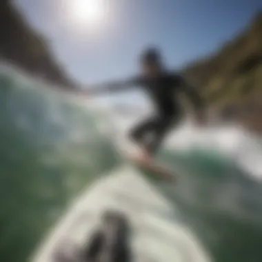 A GoPro mounted on a surfboard capturing a rider in action