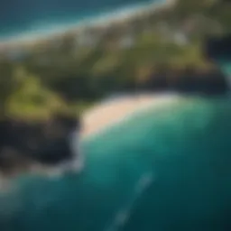 Aerial view of the stunning coastline of Honolua Bay with surfers riding waves