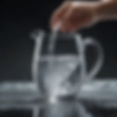 Elegant glass pitcher pouring ice water