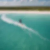 Aerial view of kite boarder riding the waves in Turks and Caicos