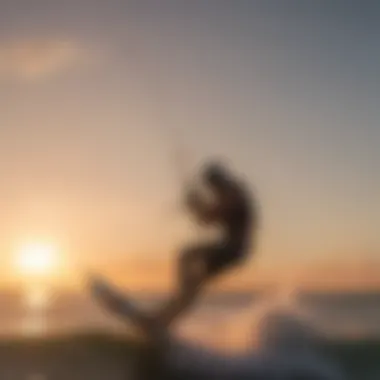 A kitesurfer catching air with the sun setting in the background