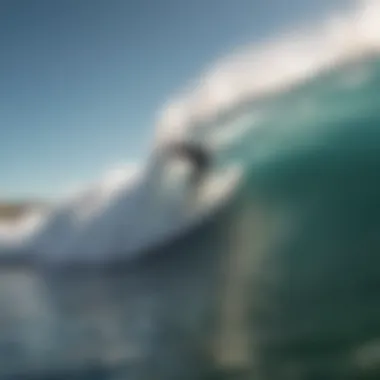 Surfer catching air off a powerful wave