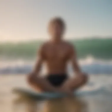 Focused surfer meditating on the beach