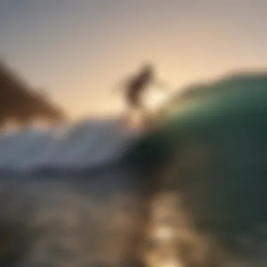 Surfer catching a wave at sunset