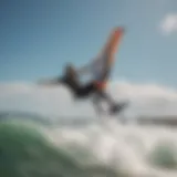 Aerial view of kitesurfer in action on the waves