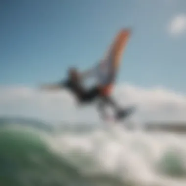 Aerial view of kitesurfer in action on the waves