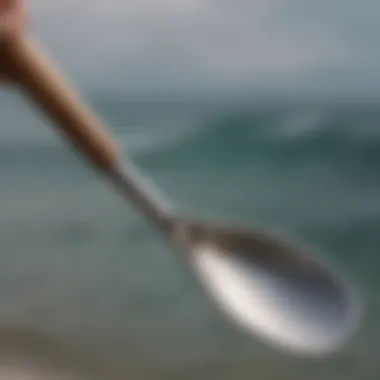 Close-up of a metal spoon used for surf fishing