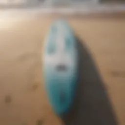 Osprey surfboard on the beach showcasing its design