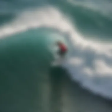 Aerial view of a surfer carving waves with precision on a 6 ft foam surfboard