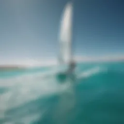 Sailboarder gliding over the turquoise waters of Aruba