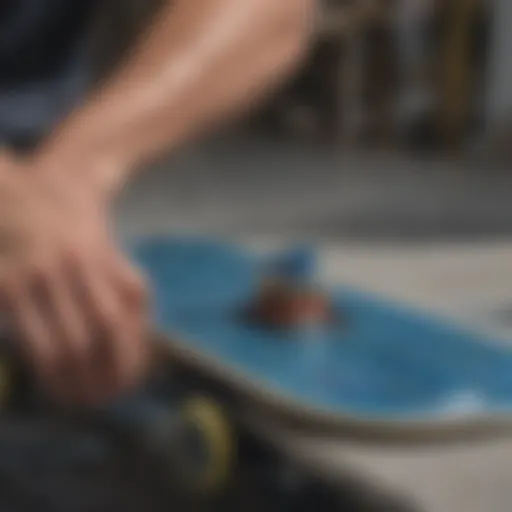 Skater applying blue wax on skateboard edge