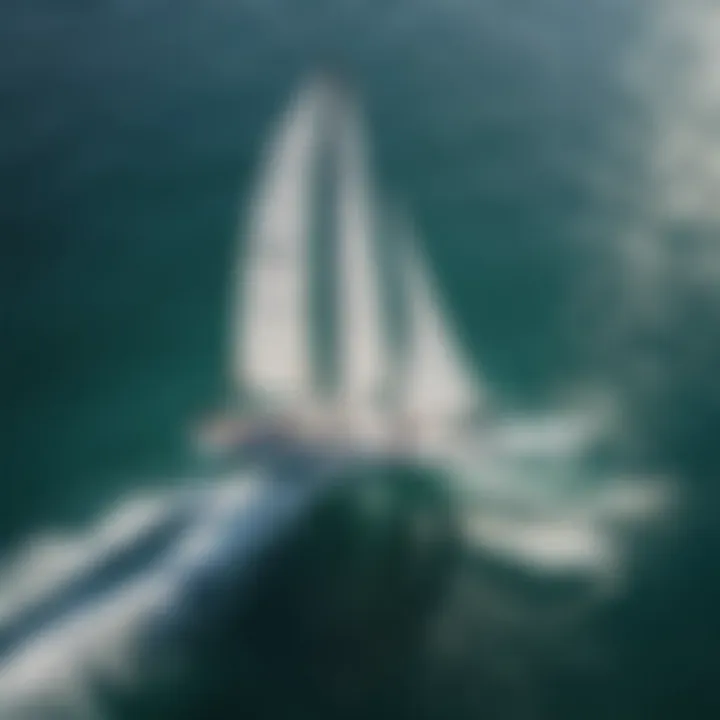 Aerial view of wing sailors gliding smoothly over crystal-clear ocean waters