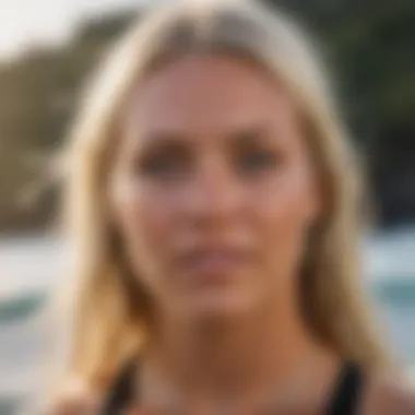 A close-up of Bethany Hamilton's determined gaze as she prepares to catch a wave