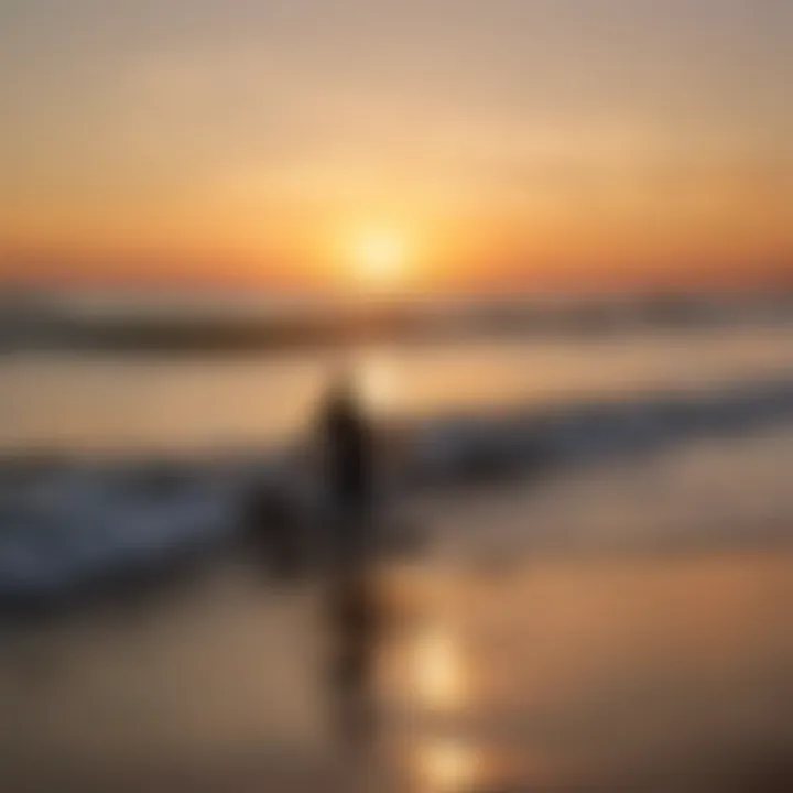 Sunset silhouette of a surfer against the backdrop of Topsail's coastline