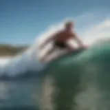 Surfer catching a wave at Byron Bay