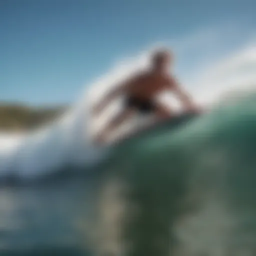 Surfer catching a wave at Byron Bay