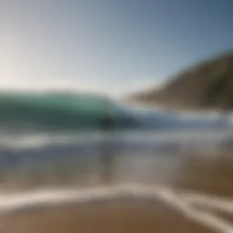 Surfer checking conditions before hitting the waves