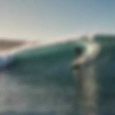 Surfer with surfboard at Mavericks