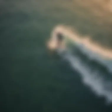 Surfer capturing aerial view using Go Pro Surfboard Mount