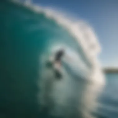 Surfer navigating through a challenging barrel wave in Aruba