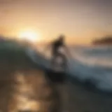 Surfer catching a wave at sunrise in Montezuma