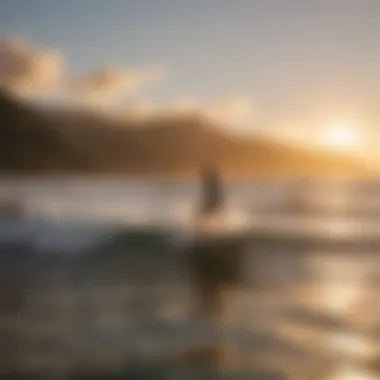 Sunset view of surfers at North Shore Oahu