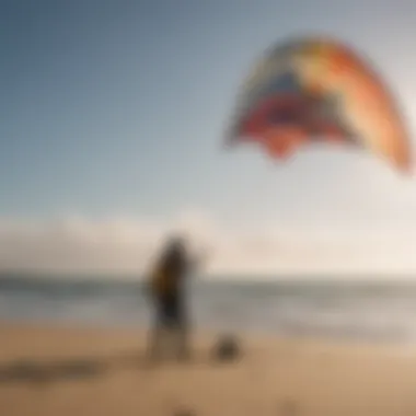 A serene beach setting with a kite enthusiast adjusting equipment before takeoff